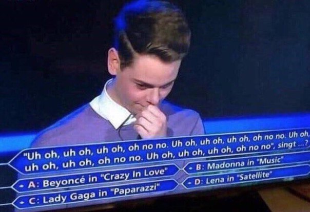 a man in a suit is sitting on a television screen