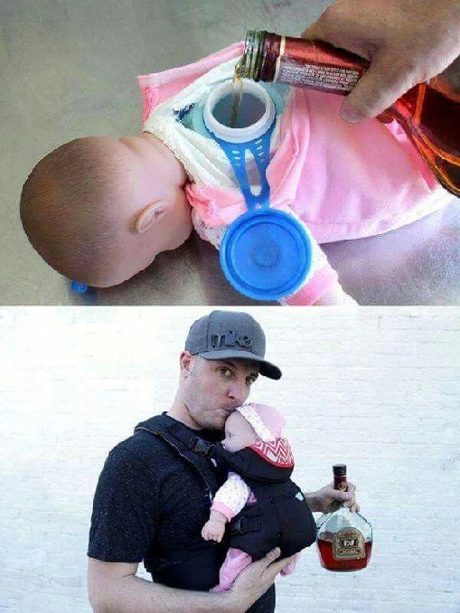 a man holding a baby in his arms