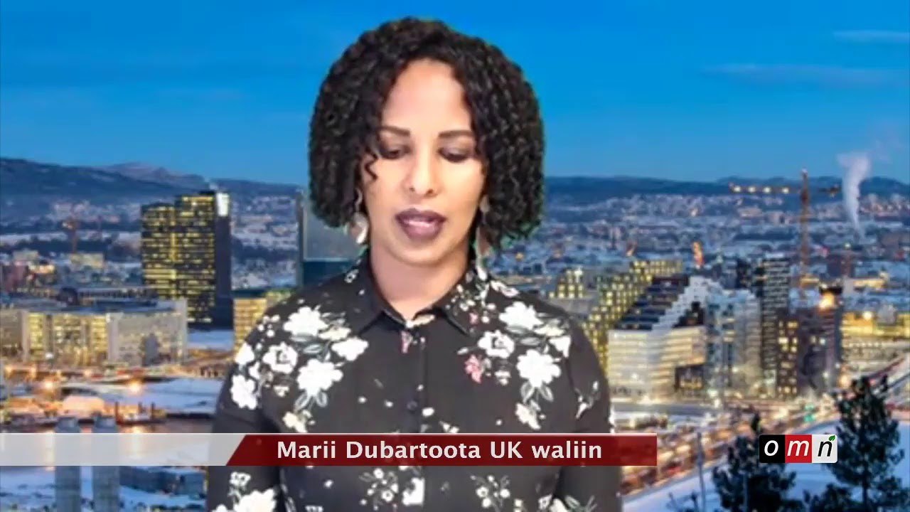 a woman in a black shirt and white flowers on a city skyline