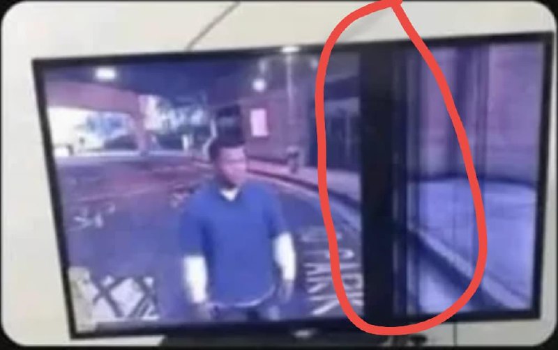 How to get this black thing a man is seen on a television screen