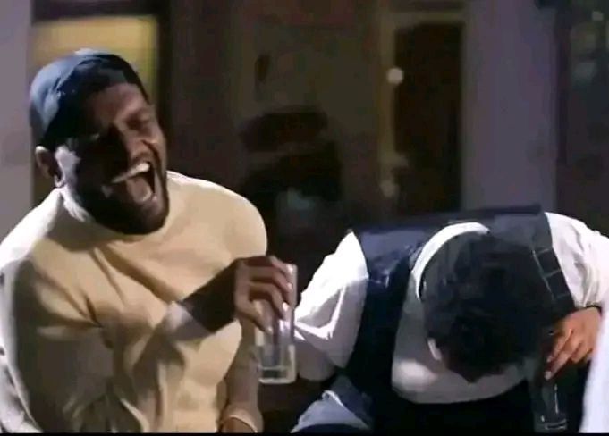 a man in a tuk is being a woman