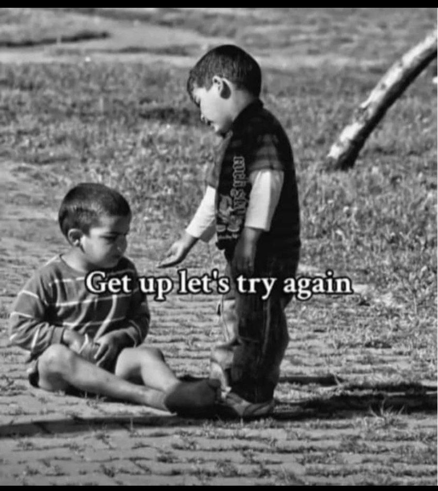 a boy and a boy playing together with the words get it s try